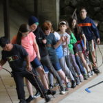 An icon-sized photo of campers doing a group activity together
