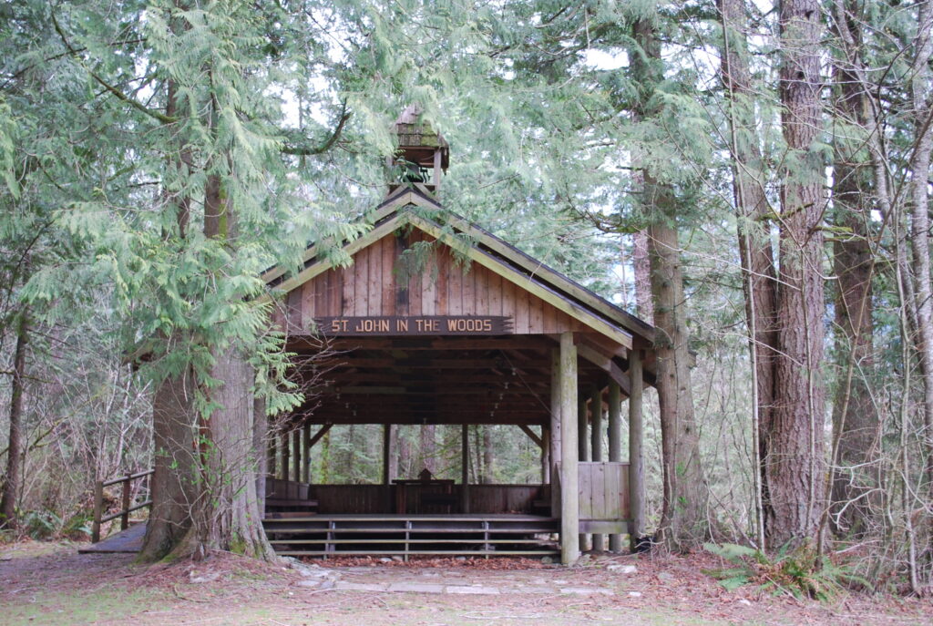 An outdoor open-air chapel is situated in the trees. Its name is Saint John in the Woods